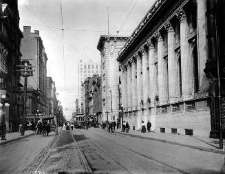 Looking east on King Street West from west of Bay Street, Bank of Toronto on right