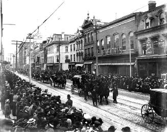 Funeral procession of Sir Oliver Mowat, Yonge Street at Shuter Street