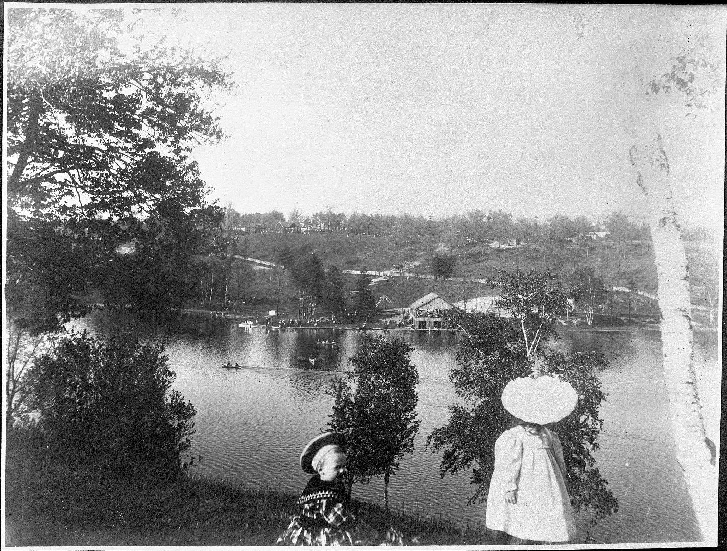 HIGH PARK, Grenadier Pond, looking east from west bank, showing boat-house on east bank