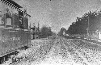 Yonge Street looking north from about Davisville Avenue. Image shows a street view and a very l ...