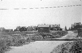 Duplex Ave., looking north from about Eglinton Ave. Image shows a big meadow with some resident ...