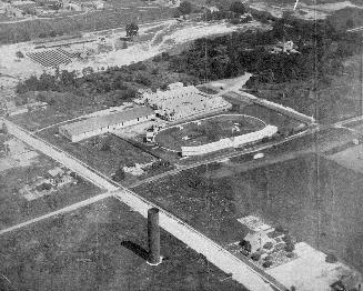 Historic photo from 1920 - Eglinton Hunt Club, water tower, and James Pears and Son brick yards in North Toronto