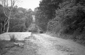 Historic photo from Tuesday, June 15, 1954 - Heath St. E., between Hudson Drive & Brendan Rd., showing site of bridge over G.T.R. Belt Line. in Moore Park