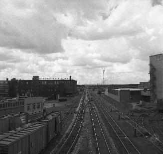 C.P.R. tracks, looking west from Old Weston Road bridge, showing Heintzman & Co. factory in left background