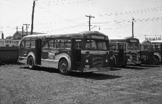 Hollinger Bus Lines, bus #70, at garage, Woodbine Avenue, southeast corner O'Connor Drive, looking southwest