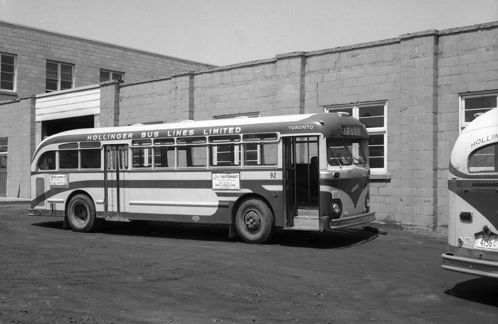 Hollinger Bus Lines, bus #92, at garage, Woodbine Avenue, southeast corner O'Connor Drive, looking northwest