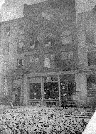 Fire (1904), Bay St., east side, between Wellington & Melinda Streets, showing shop of H. F. Sharpe & Co., photographic goods