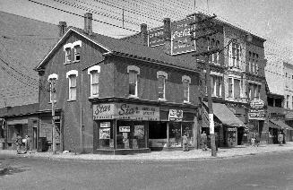Historic photo from Sunday, May 2, 1954 - Kensington Stores - Star Service stores, McGuires Appliances (Spadina and Baldwin) in Kensington Market