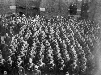 Image shows members of the Canadian Army standing in rows.