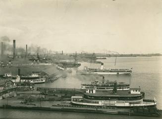 Image shows a few boats at the Harbor.