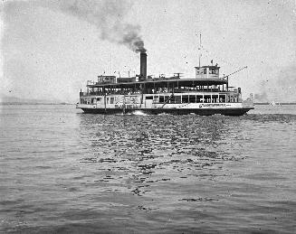 Image shows a ferry on the lake.