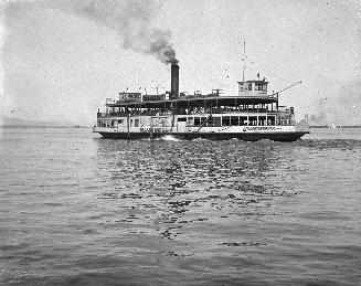 Image shows a ferry on the lake.