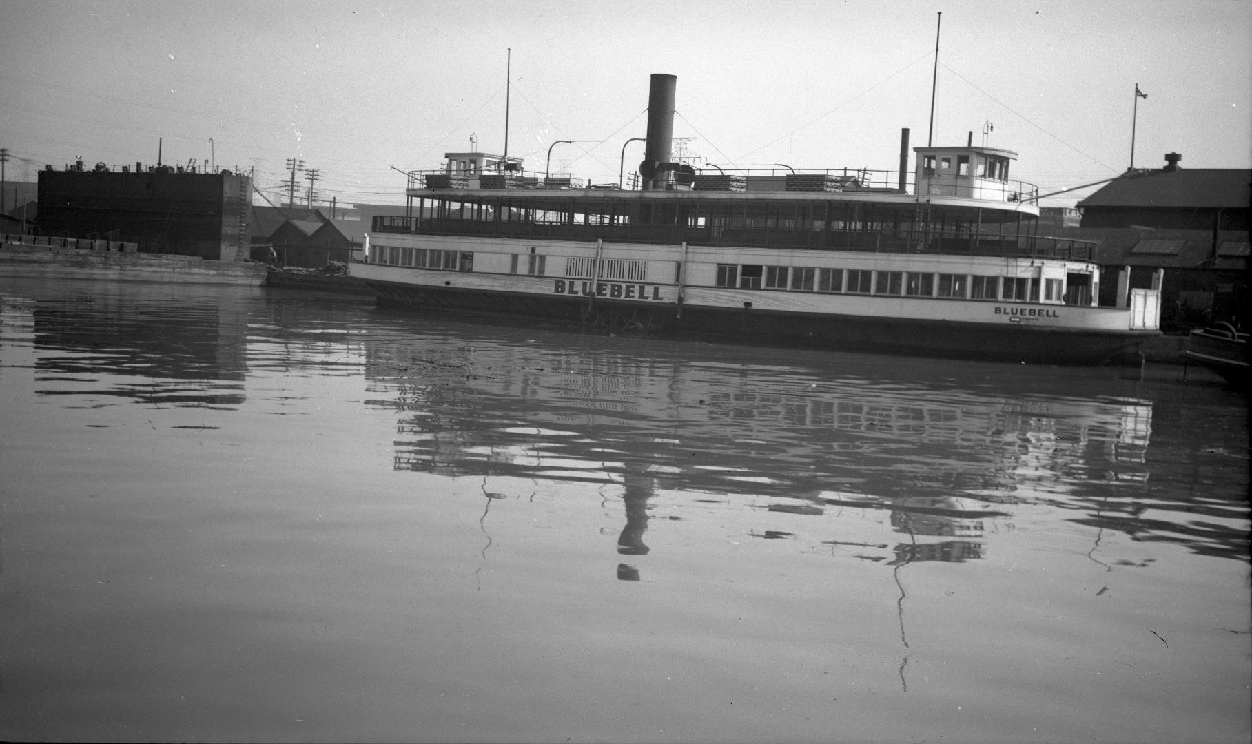 Image shows a ferry at the wharf.