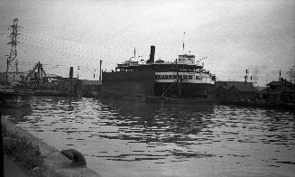 Image shows a ferry Bluebell by the docks.