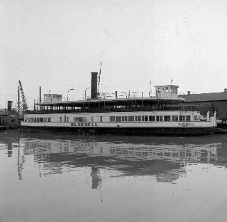 Image shows a Bluebell ferry by the docks.