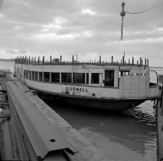 Image shows a Bluebell ferry by the docks.