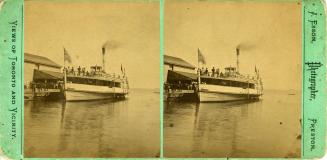 Image shows a ferry at wharf.
