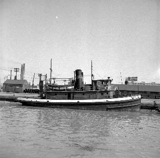 Image shows a tugboat at the Marine Yard.