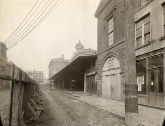 St. Lawrence Market. north Market (1850-1904), Front Street East, north side, betwest Market & Jarvis Streets showing west side, during alterations of 1898