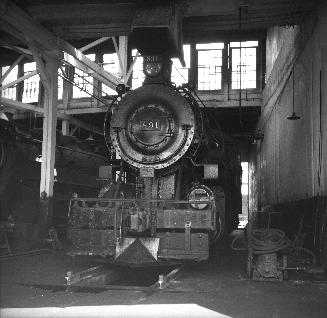 Historic photo from Saturday, August 17, 1957 - Interior of the roundhouse at the CPR Runnymede Yards - Lambton Road Steam Engine 891 in Runnymede