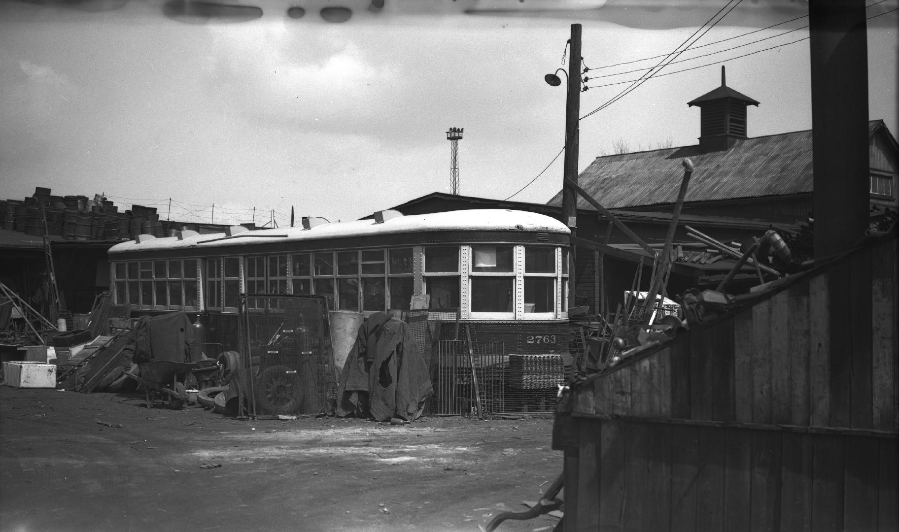 T.T.C., #2763, at Ontario Iron & Metal Co., scrap yard, Dundas Street West, north side, e. of Jane St., Toronto, Ontario
