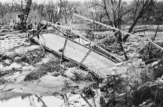 Historic photo from Sunday, November 21, 1954 - Hurricane Hazel damage - West Don River bridge at Yonge Street in Hoggs Hollow