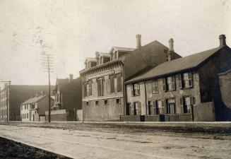 Historic photo from 1912 - Star Hotel on Front St. W. converted into stables in Entertainment District