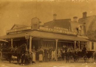 Wordley, William M., butcher shop, Church St., southeast corner Carlton St., showing staff