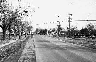 Dundas St. West, looking e. from west of C.P.R. level crossing west of Royal York Road