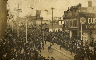 South African War, parade of returned Canadian troops on Yonge Street, looking north from south of Charles St