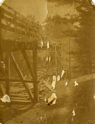 Historic photo from 1872 - Collapsed wooden bridge on Park Rd., bridge over Rosedale Ravine, n. of Collier St. in Rosedale