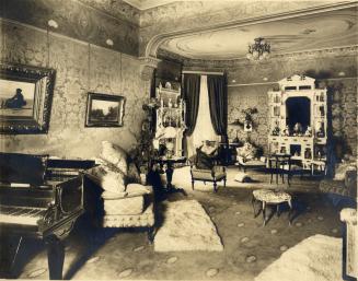 Historic photo from 1900 - Piano, chairs, art, and wallpaper in the drawing room of Ermeleigh in Cabbagetown