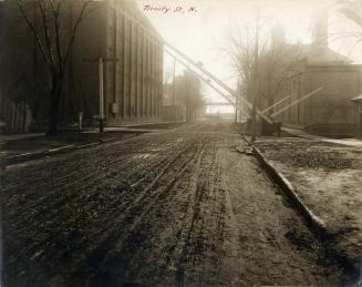 Trinity St., looking south across C.P.R. tracks towards Mill St