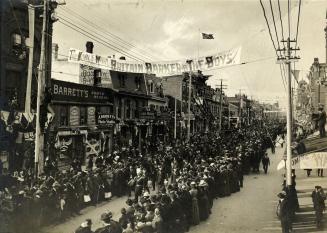 South African War, parade of returned Canadian troops on Yonge Street, looking north from Edward St