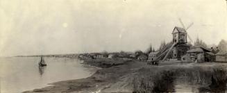 Image shows a mill and a few waterfront houses by the lake.