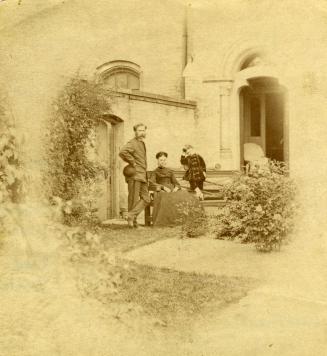 Historic photo from 1868 - University College, Deans house and garden; looking n.e. William Loudon, Sarah Rattray Loudon, and young Allie Loudon in University of Toronto (U of T)