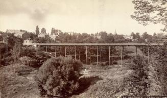 Historic photo from 1885 - Huntley St., bridge, north of Bloor St. looking s.w. - also known as the White Bridge in Rosedale