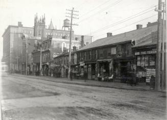 Queen Street West, Yonge To Simcoe Streets, south side, looking e