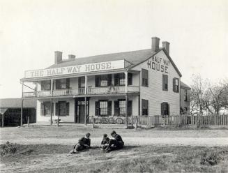 Historic photo from 1912 - Half Way House Hotel - boys and bikes outside in Cliffside