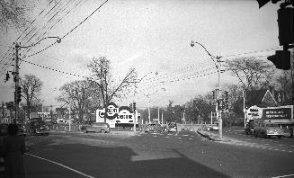 Historic photo from 1952 - Jarvis St., looking n.e. showing Mt. Pleasant Rd. at right. Regent Gasoline & Globe and Mail  billboards in Upper Jarvis
