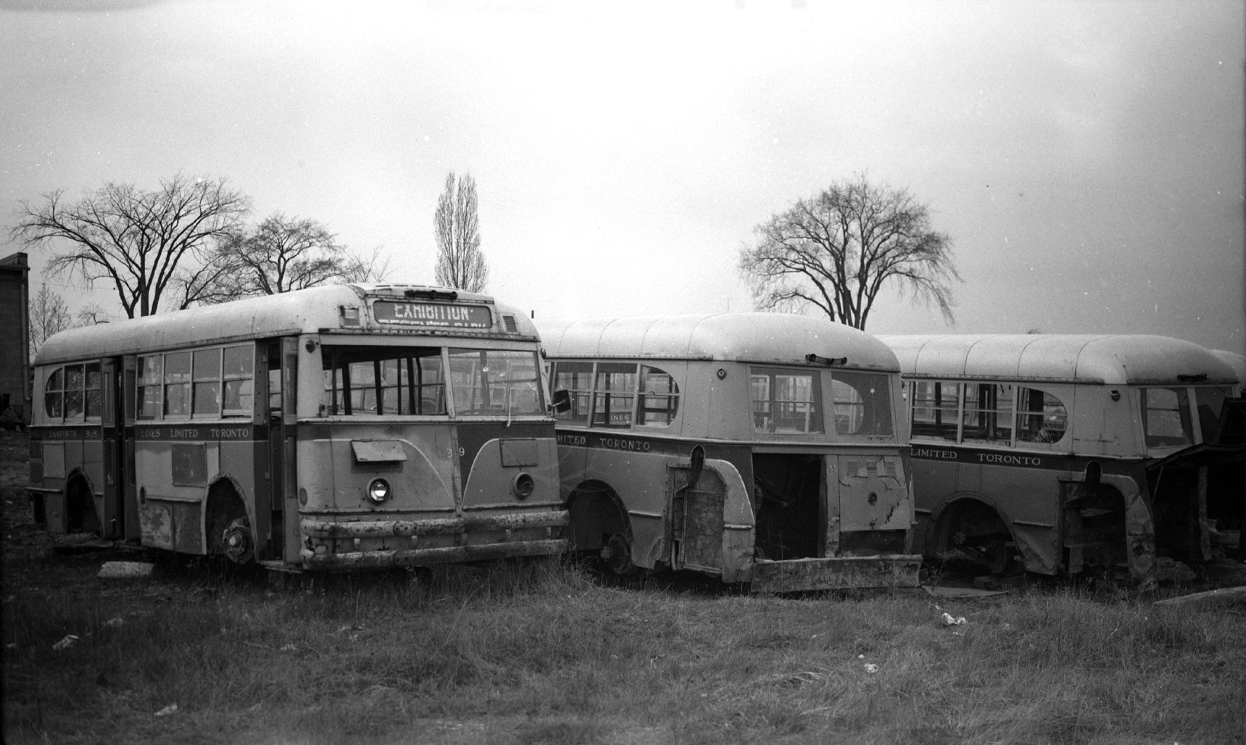 Danforth Bus Lines, bus, behind garage, Dufferin St