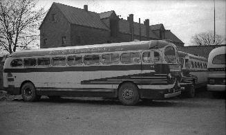 West York Coach Lines, garage [parking lot] Dundas Street West, southwest corner Pacific Ave, looking southwest, showing bus #56