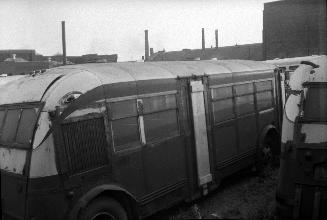 T.T.C., garage, Sherbourne Garage, Sherbourne St., northwest corner Esplanade E., showing 700 class buses