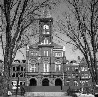 Historic photo from Friday, April 18, 1958 - Centre block and bell tower of 1891 Upper Canada College building during demolition in Forest Hill
