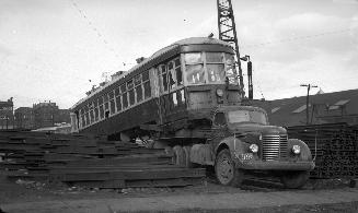 T.T.C., #2182, being scrapped, at George St. yard, looking northeast to Front Street East