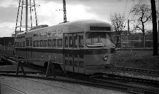 Image shows a rail car on tracks.