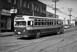 T.T.C., bus #1175, on Yonge Street, west side, looking north from Eglinton Avenue West. Image s ...