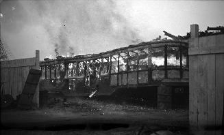 T.T.C., #2839, being burnt, on lot on Mill St