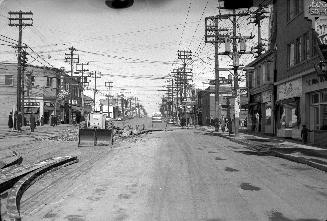 Yonge St. looking north from south of Eglinton Ave., showing removal of streetcar tracks. Image ...