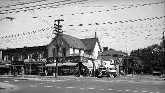 Historic photo from Tuesday, October 7, 1952 - Grainger's florists and Chaplin Groceteria at Yonge and Davisville in Davisville Village